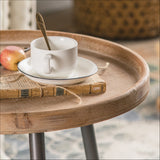 Small Couch Side Coffee Table With a Wooden Table Top And Smooth Flat Black Metal Legs